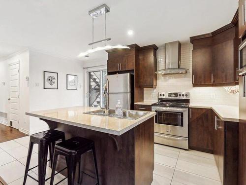 Cuisine - A-143 Ch. De L'Équerre, Laval (Sainte-Rose), QC - Indoor Photo Showing Kitchen With Upgraded Kitchen