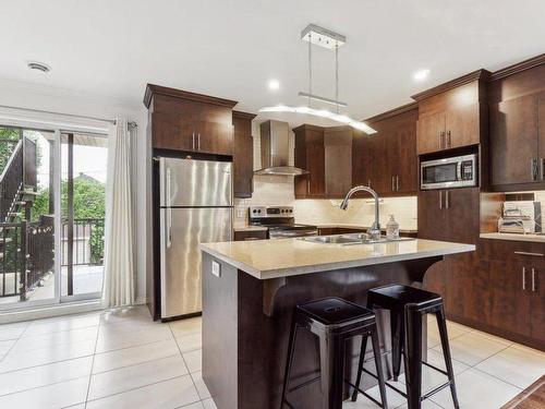 Cuisine - A-143 Ch. De L'Équerre, Laval (Sainte-Rose), QC - Indoor Photo Showing Kitchen With Upgraded Kitchen