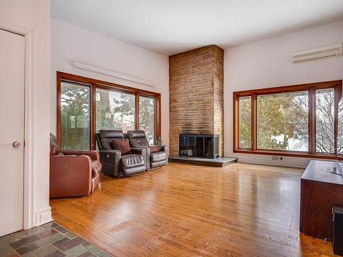 Living room - 600  - 600A Rue Franchère, Laval (Duvernay), QC - Indoor Photo Showing Living Room With Fireplace