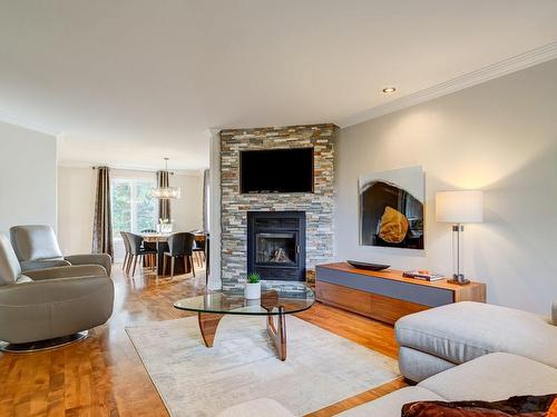 Living room - 4215 Rue Du Myosotis, Saint-Bruno-De-Montarville, QC - Indoor Photo Showing Living Room With Fireplace