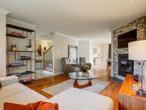 Living room - 4215 Rue Du Myosotis, Saint-Bruno-De-Montarville, QC - Indoor Photo Showing Living Room With Fireplace