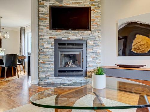 Living room - 4215 Rue Du Myosotis, Saint-Bruno-De-Montarville, QC - Indoor Photo Showing Living Room With Fireplace