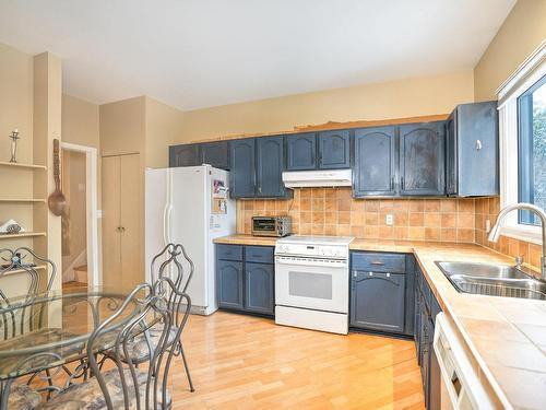 Cuisine - 8 Rue Capri, Dollard-Des-Ormeaux, QC - Indoor Photo Showing Kitchen With Double Sink