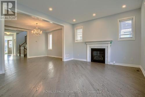 704 Devario Crescent, Ottawa, ON - Indoor Photo Showing Living Room With Fireplace