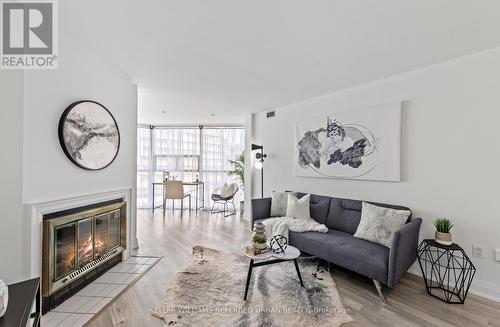 1003 - 701 King Street W, Toronto, ON - Indoor Photo Showing Living Room With Fireplace