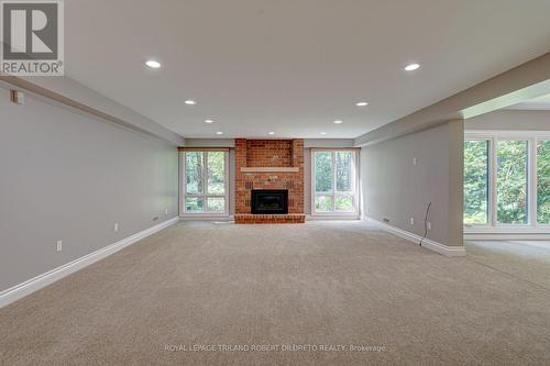 82 Chestnut Court, London, ON - Indoor With Fireplace