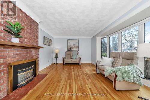 2099 Balharrie Avenue, Ottawa, ON - Indoor Photo Showing Living Room With Fireplace