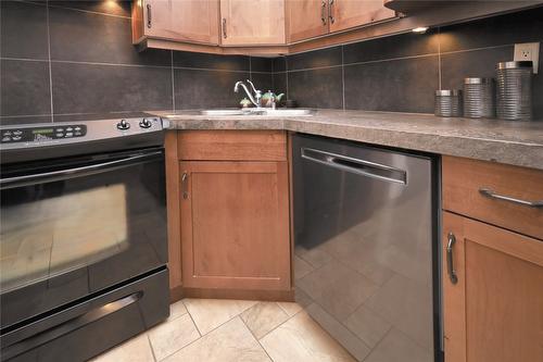 1107-7495 Columbia Avenue, Radium Hot Springs, BC - Indoor Photo Showing Kitchen With Double Sink