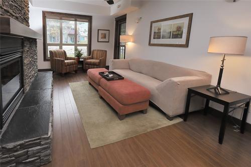 1107-7495 Columbia Avenue, Radium Hot Springs, BC - Indoor Photo Showing Living Room With Fireplace