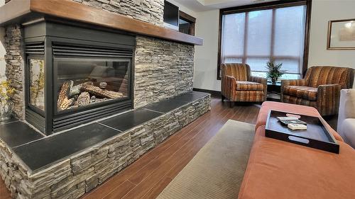 1107-7495 Columbia Avenue, Radium Hot Springs, BC - Indoor Photo Showing Living Room With Fireplace