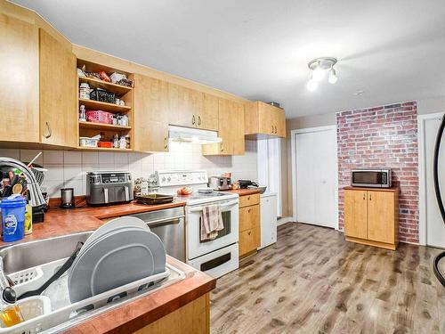 Kitchen - 16 1Re Avenue, Boisbriand, QC - Indoor Photo Showing Kitchen With Double Sink