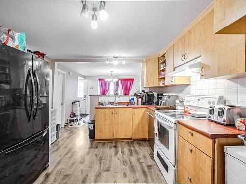 Kitchen - 16 1Re Avenue, Boisbriand, QC - Indoor Photo Showing Kitchen With Double Sink