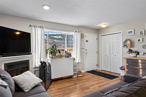 203-380 Shepherd Road, Chase, BC - Indoor Photo Showing Living Room With Fireplace