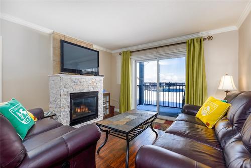 301-303-1151 Gerry Sorensen Way, Kimberley, BC - Indoor Photo Showing Living Room With Fireplace