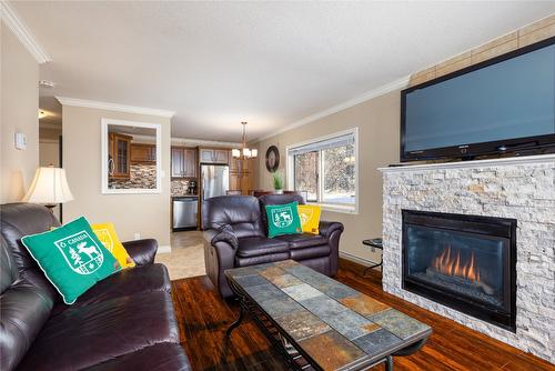 301-303-1151 Gerry Sorensen Way, Kimberley, BC - Indoor Photo Showing Living Room With Fireplace