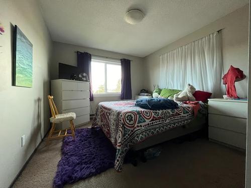 404-606 18Th Avenue, Cranbrook, BC - Indoor Photo Showing Bedroom