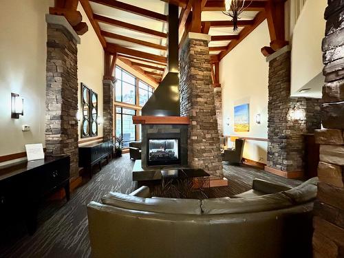 414-400 Stemwinder Drive, Kimberley, BC - Indoor Photo Showing Living Room With Fireplace