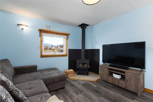 8079 Sorensen Road, Kimberley, BC - Indoor Photo Showing Living Room With Fireplace