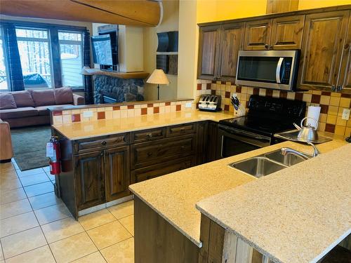 O2-A-1351 Gerry Sorensen Way, Kimberley, BC - Indoor Photo Showing Kitchen With Double Sink