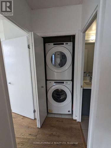 4712 - 35 Mariner Terrace, Toronto, ON - Indoor Photo Showing Laundry Room