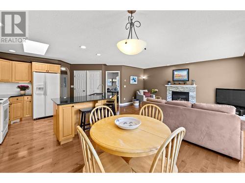 3639 Overlander Drive, Kamloops, BC - Indoor Photo Showing Dining Room With Fireplace