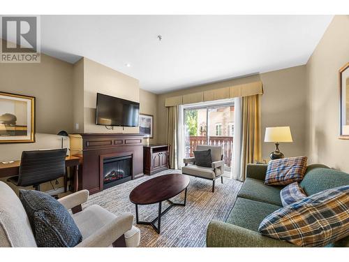 3250 Village Way Unit# 1207D, Sun Peaks, BC - Indoor Photo Showing Living Room With Fireplace