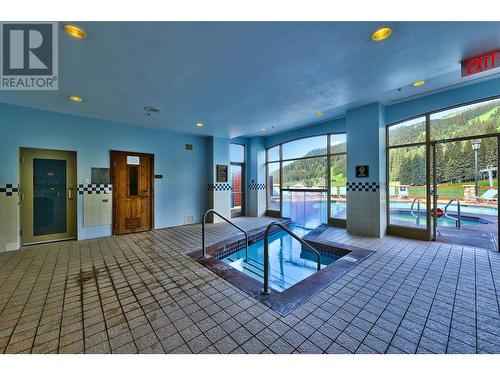 3250 Village Way Unit# 1207D, Sun Peaks, BC - Indoor Photo Showing Other Room With In Ground Pool