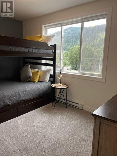 1240 Alpine Road Unit# 24, Kamloops, BC - Indoor Photo Showing Bedroom With Fireplace