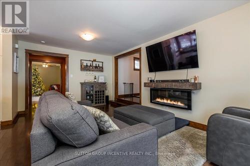 2084 Sunnidale Road, Springwater, ON - Indoor Photo Showing Living Room With Fireplace