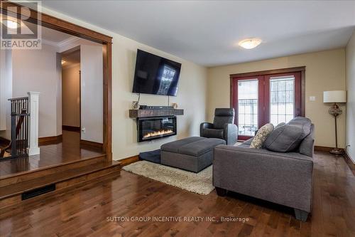 2084 Sunnidale Road, Springwater, ON - Indoor Photo Showing Living Room With Fireplace