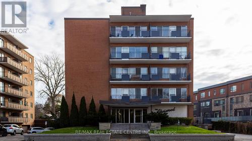 207 - 371 Lakeshore Road W, Mississauga, ON - Outdoor With Balcony With Facade