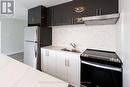 207 - 371 Lakeshore Road W, Mississauga, ON  - Indoor Photo Showing Kitchen With Double Sink 