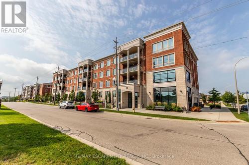 306 - 175 Commonwealth Street, Kitchener, ON - Outdoor With Facade