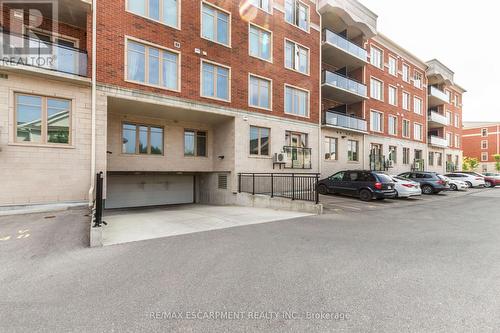 306 - 175 Commonwealth Street, Kitchener, ON - Outdoor With Facade