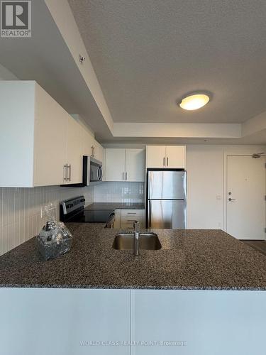 609 - 107 Roger Street, Waterloo, ON - Indoor Photo Showing Kitchen With Double Sink