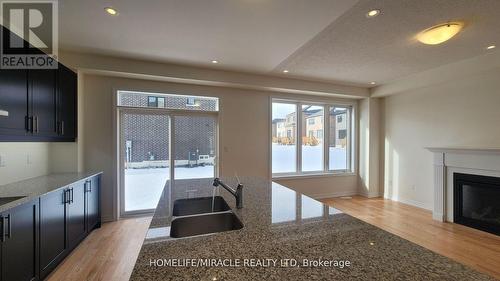 2074 Hallandale Street, Oshawa, ON - Indoor Photo Showing Kitchen With Fireplace With Double Sink