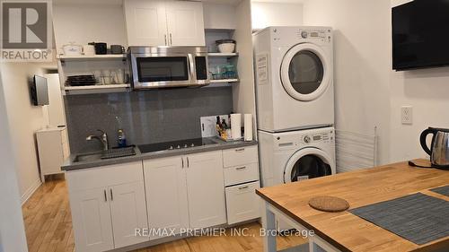 B - 29 Rusholme Road, Toronto, ON - Indoor Photo Showing Laundry Room