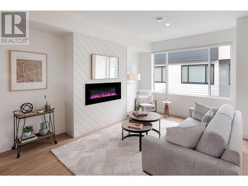 Living Room - 1225 Findlay Road Unit# 9, Kelowna, BC - Indoor Photo Showing Living Room With Fireplace