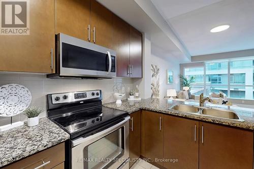 217 - 1 Hurontario Street, Mississauga, ON - Indoor Photo Showing Kitchen With Double Sink With Upgraded Kitchen