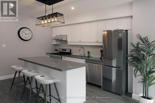 Upper - 2134 Dundas Street W, Toronto, ON - Indoor Photo Showing Kitchen With Stainless Steel Kitchen