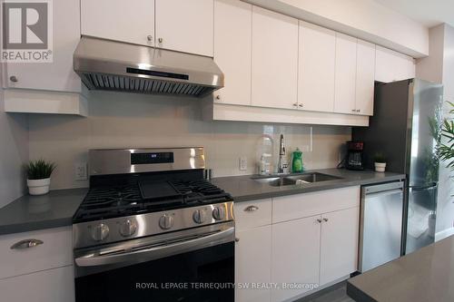 Upper - 2134 Dundas Street W, Toronto, ON - Indoor Photo Showing Kitchen With Double Sink