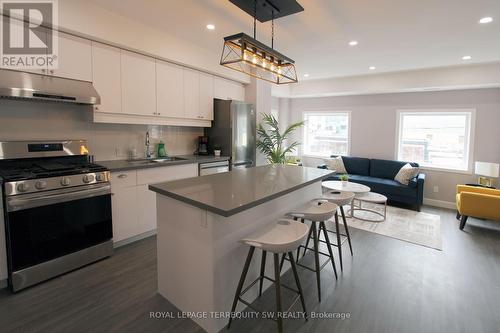 Upper - 2134 Dundas Street W, Toronto, ON - Indoor Photo Showing Kitchen With Double Sink