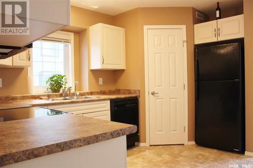 137 503 Colonel Otter Drive, Swift Current, SK - Indoor Photo Showing Kitchen With Double Sink