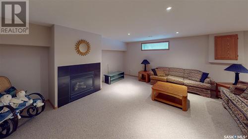 3062 Birch Crescent, Regina, SK - Indoor Photo Showing Basement With Fireplace