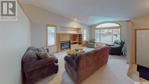 3062 Birch Crescent, Regina, SK - Indoor Photo Showing Living Room With Fireplace