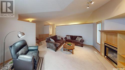 3062 Birch Crescent, Regina, SK - Indoor Photo Showing Living Room With Fireplace