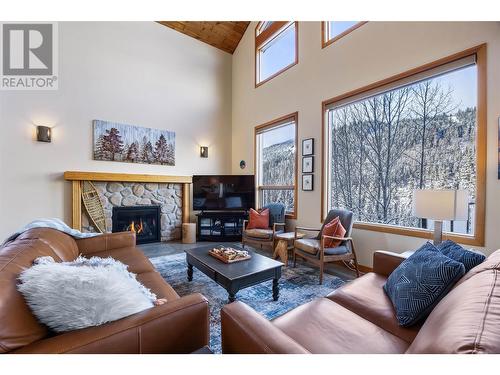 2416 Fairways Drive, Sun Peaks, BC - Indoor Photo Showing Living Room With Fireplace