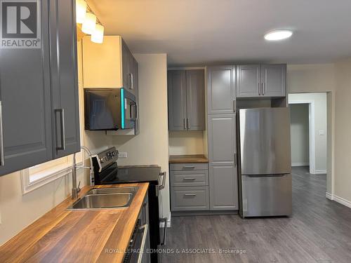 256 Renfrew Street, Pembroke, ON - Indoor Photo Showing Kitchen With Stainless Steel Kitchen With Double Sink