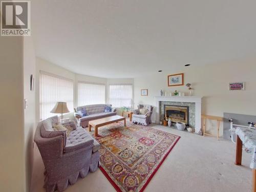 6358 King Ave, Powell River, BC - Indoor Photo Showing Living Room With Fireplace