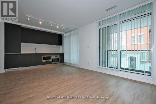 210 - 377 Madison Avenue, Toronto, ON - Indoor